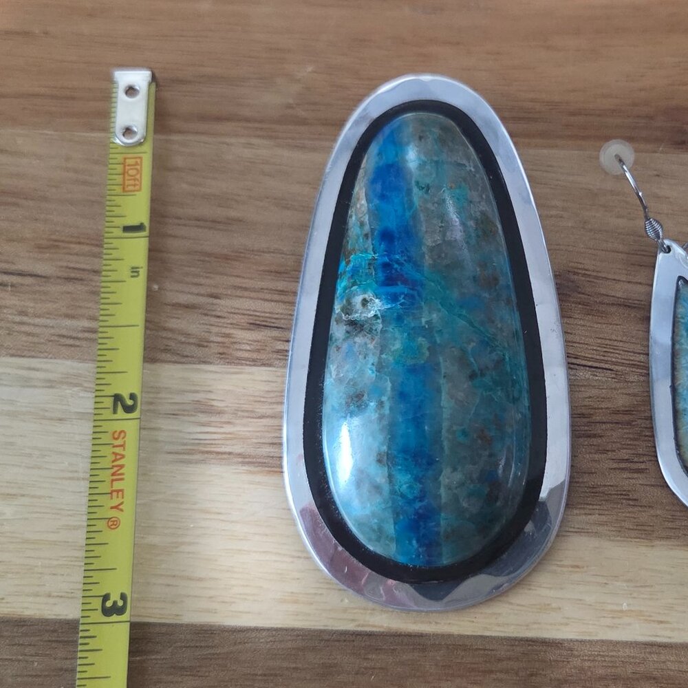 Silver pendant and matching earrings